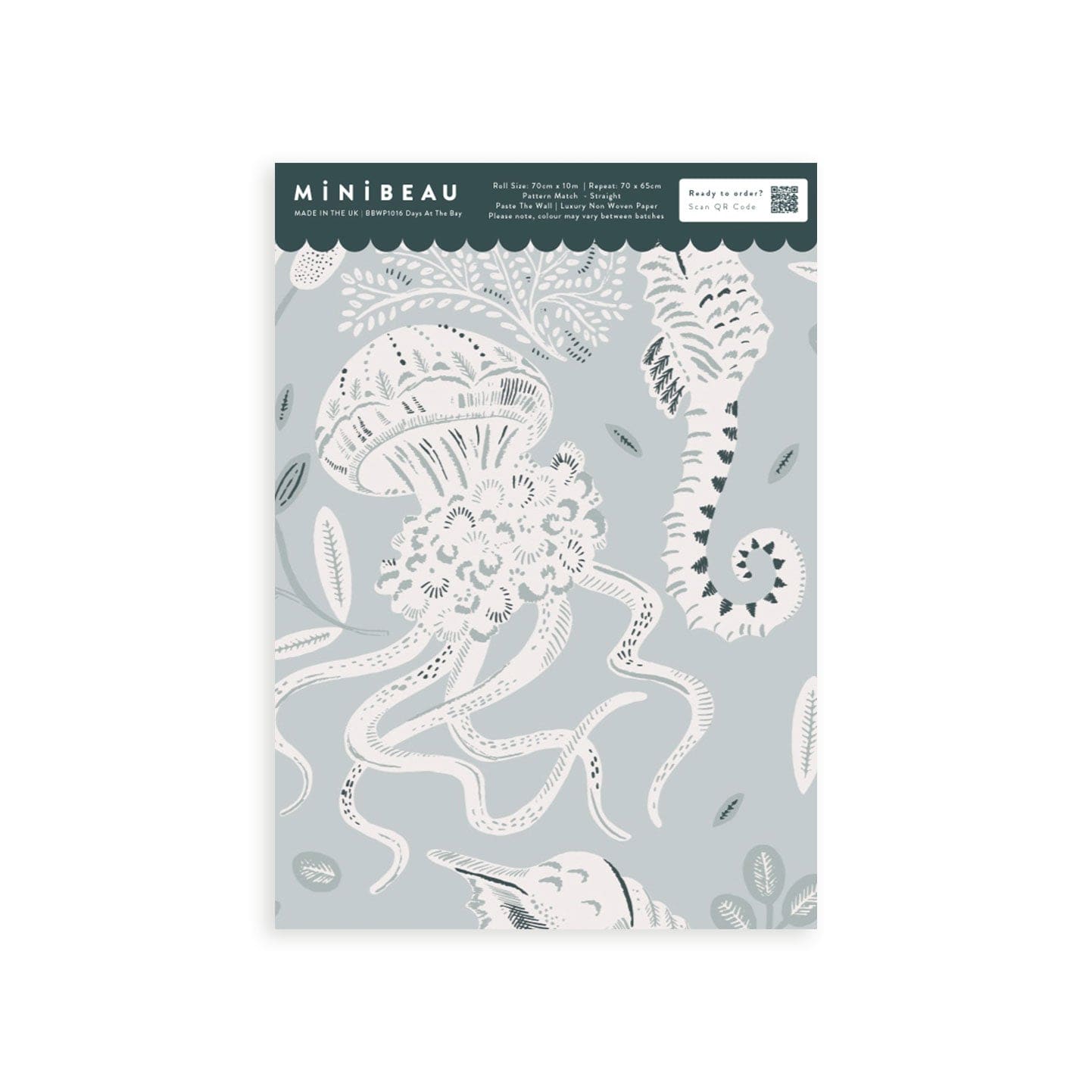 Ocean inspired wallpaper sample of a white swimming turtle, shells and fish with leaves and flowers. Blue background.
