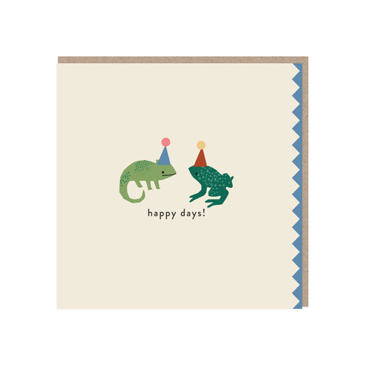 Square greetings card. Off-white background with a chameleon and a frog wearing a blue hat with pink pom pom and brown hat with yellow pompom respectively standing in the middle over the words happy days! A zigzag edge in blue is on the right/open side. Comes with a brown kraft envelope