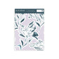 Wallpaper sample of teal deers, rabbits and flowers with a pastel purple background. 