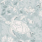 Ocean inspired wallpaper sample of a white swimming turtle, shells and fish with leaves and flowers. Blue background. 